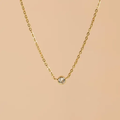 Test Bougie-Bijou Verte Parfum Coton Les Merveilleuses : une bougie sympa avec un collier surprise dedans